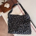 Minimalist black canvas tote bag with small floral print and wide shoulder strap - Black Background Small Floral(50#)
