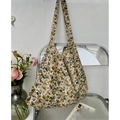 Floral print canvas tote bag with EMIS logo in beige and blue on an acrylic chair - Pastoral Style Floral(8#)