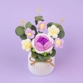 Detail of handmade crochet purple rose bouquet in a white textured ceramic vase - Gradient Purple Rose