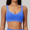 Blue yoga sports bra with white contrast piping and supportive wide band - Ink Blue