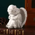 White resin sleeping angel sculpture with folded wings for home and office decoration - Left Sleeping Angel
