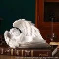 White Nordic angel sculpture figurine lying on side with wings, 18cm resin ornament - Left Lying Winged Angel