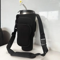 Black neoprene pouch for 40oz tumbler with dual zipper pockets and floral straw cover - Black - Pockets