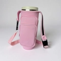 Pink neoprene water bottle carrier for 40oz tumbler with adjustable strap and pockets - Pink - With Interlocking Strap (including Shoulder Strap)