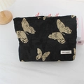 Detail der vintage schwarzen Jacquard-Kosmetiktasche mit goldener Schmetterlingsstickerei - Goldene Schmetterlingsstickerei / Große Kosmetiktasche