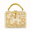 Detail of luxury box bag with golden floral metal hollow design and pearl texture - Apricot