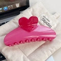 Glossy pink heart hair claw clip for women on a textured beige fabric background - 13cm / Rose Red