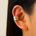 Vintage golden leaf ear cuff without piercing featuring detailed feather texture on ear - Feather Shape Style / KC Gold