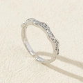 Elegant silver adjustable ring with twisted band and sparkling cubic zirconia stones - Style 38