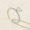 Minimalist silver-tone adjustable ring featuring a pear-shaped zircon and pave stones - Style 32