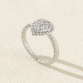 Adjustable silver-tone ring with a heart-shaped zircon center and textured band. - Style 34