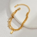 Mehrlagiges Edelstahlarmband in Gold mit Sternanhängern und Zirkonia auf Steintablett - Gold Weißer Zirkonia (B1011-02Bai)