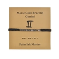 Detailed view of Gemini Morse code bracelet featuring black cord and hematite beads - Gemini