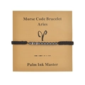 Handmade Aries Morse code bracelet with black obsidian beads on a kraft card - Aries