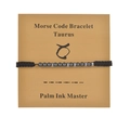 Taurus morse code bracelet with black obsidian beads and woven cord on display card - Taurus