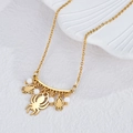 Collier en or 18 carats avec pendentifs araignées et perles blanches sur coquillage - Style Araignée Dorée