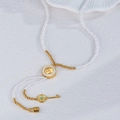 Collana di perle in acciaio inossidabile dorato con ciondolo pesci, chiave e lucchetto - Lucchetto