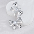 Elegant silver bow earrings with white pearl inlay, stylish minimalist jewelry for women - Silver Style (OLBE874-01)