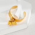 Detailed shot of gold-plated stainless steel open ring with five hanging cylinder charms - Cylindrical Metal Dangle Style (R791-cgz)