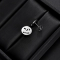 Macro view of stainless steel pumpkin skull earrings with butterfly back fasteners - Evil Expression - Steel Color