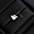 Macro shot of polished stainless steel ghost stud earrings for Halloween style - Devil Soul