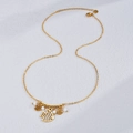 Gold stainless steel fish pendant necklace with white beads and adjustable chain - Hollow Fish Charm Style (Style 3)