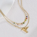 Französische 18k Gold Doppel-Halskette mit Kolibri-Anhänger, bunten Perlen und Sternen - Gold