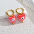 Gouden oorringen met rode hartvormige hangers en boze oog motief op witte steen - Rood