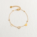 Elegant gold stainless steel bracelet with hollow heart charms and sparkling zirconia - Heart Bracelet