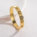 Golden stainless steel flower bangle with black floral centerpiece and textured rim - Six-Petal Flower Style (B1140-hei) / Gold Black Stone