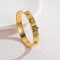 Elegant gold-plated stainless steel flower bangle with black gemstone on white base - Black Zircon