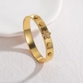 Elegant gold-plated stainless steel cuff bracelet with floral relief and crystal inlay - White Zircon