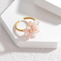 Floral crystal bead open ring in pink and white with a gold braided adjustable band - Pink