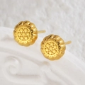 Macro detail of 18K gold-plated floral stud earrings with textured petals and center - Gold Flower Style