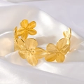 Elegant gold flower cuff bracelet with brushed metal texture on a silk fabric background - Gold Flower Style (B1113)