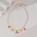 Detail of stainless steel beaded necklace with cherry charms and adjustable lobster clasp - Chili Style (N2214-lajiao)