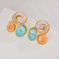 Detailed macro view of spiral geometric earrings with gold finish and tricolor enamel inserts - Tri-color Spiral Style (E1037)
