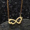 Gold infinity butterfly necklace with zircon accent on dark textured stone background - Gold Butterfly Style (N143-02)