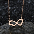 Rose gold infinity symbol and bow pendant necklace with zircon on a black stone base - Rose Gold Butterfly Style (N143-04)
