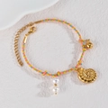 Bracciale intrecciato stile marino con ciondolo a nautilus e perle bianche chic - Stile Nautilus (B1213-hailuo)