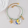 Bracciale oceano intrecciato a mano con ciondoli ippocampo e stella marina in oro 18k - Stile Pesce Tropicale Giallo (B1213-huangyu)