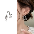 Orecchini a perno con spine d'argento e stelle in zircone in stile metallo liquido - Argento