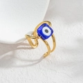 Macro shot of French vintage open ring with a blue square eye charm and double gold bands - Blue Square Evil Eye Style (S-R733-E-SL)