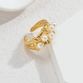 Macro detail of gold-plated bamboo-style open ring with five white pearls - R680-zz