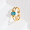 Böhmischer offener Edelstahlring in Gold mit blauem Stein und körniger Textur - Blauer Ovaler Stein-Stil / Blau (M-R854-lan)