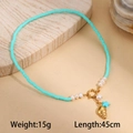 Detail of ocean-style necklace with turquoise beads, golden charms, 45cm length, 15g weight - Conch (M-N2236-hailuo)