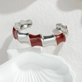 Modern wavy open bangle with red enamel segments on polished stainless steel base - Red and Silver Bamboo Style / Steel