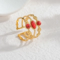 Gold stainless steel wave ring with three red stones in a vertical 45-degree setting - Red Turquoise Style / Gold with Red