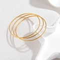 Set van drie 2mm goud vergulde roestvrijstalen armbanden met verfijnde diamant-textuur - Gouden Diamant Slijp Textuur (CXB1247-02) / Goud