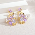 Elegante goudkleurige roestvrijstalen hangende oorbellen met paarse emaille bloemen - Paars